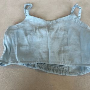 Light blue kids Zara crop tank top. In creat shape. No holes or stains.